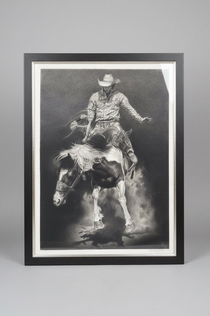 Black and white drawing of a cowboy riding a bucking bronco