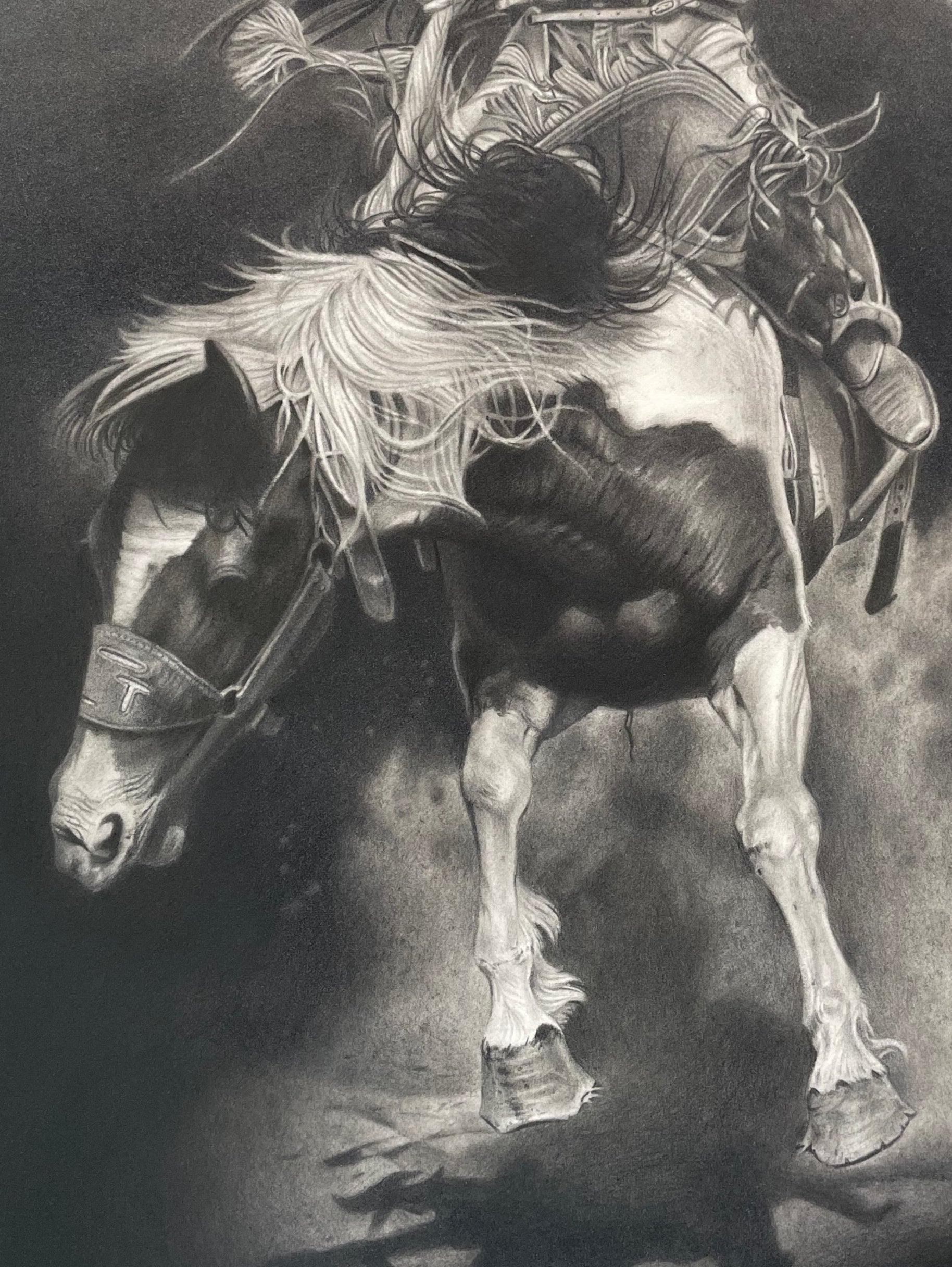 Artistic depiction of a cowboy riding a bucking horse on a dark background